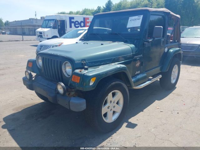 2000 JEEP WRANGLER 1J4FA59S0YP748057 Photo 1