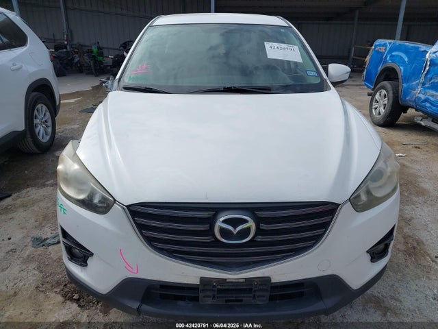 JM3KE2CYXG0697105 Mazda py