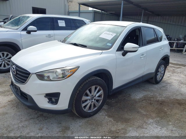 JM3KE2CYXG0697105 Mazda py