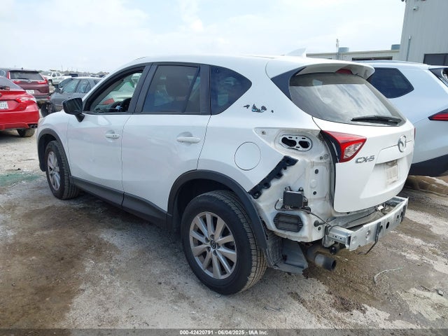 JM3KE2CYXG0697105 Mazda py