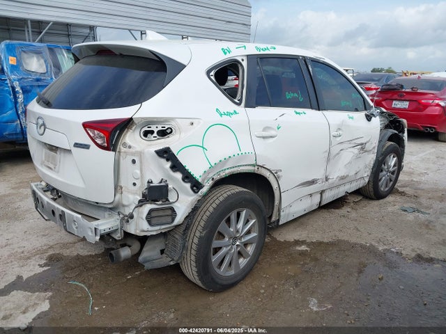 JM3KE2CYXG0697105 Mazda py