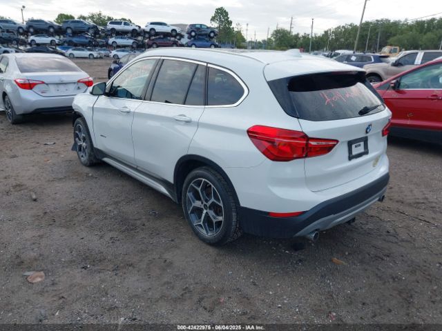2018 BMW X1 WBXHT3C33J5K30625 Photo 2