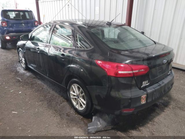 2015 FORD FOCUS 1FADP3F25FL216205 Photo 2