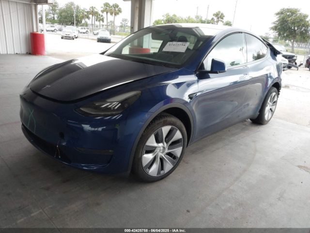 2023 TESLA MODEL Y 7SAYGDEE6PA165167 Photo 1