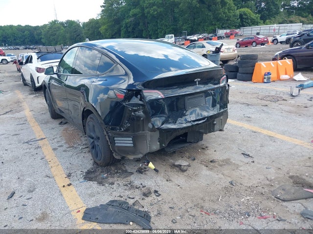 2025 TESLA MODEL Y 7SAYGDED6SA340405 Photo 2