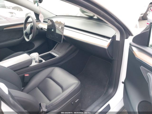 2023 TESLA MODEL Y 7SAYGDEE2PF901590 Photo 4