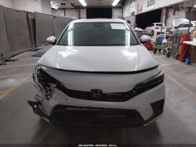 2HGFE1F97RH335905 Honda l15b7