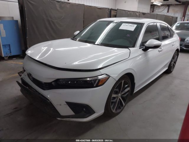 2HGFE1F97RH335905 Honda l15b7