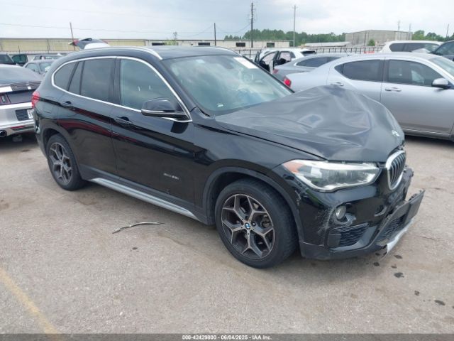 2017 BMW X1 WBXHT3Z34H4A53528