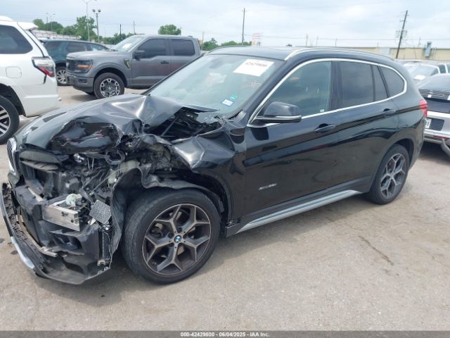 2017 BMW X1 WBXHT3Z34H4A53528 Photo 1