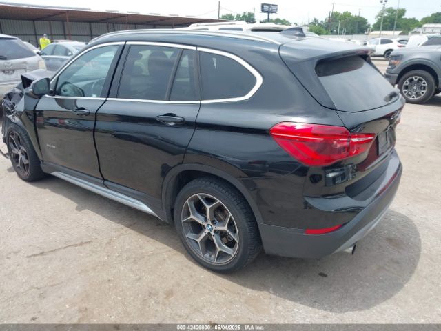 2017 BMW X1 WBXHT3Z34H4A53528 Photo 2