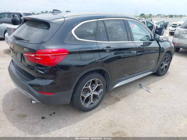 2017 BMW X1 WBXHT3Z34H4A53528 Photo 3