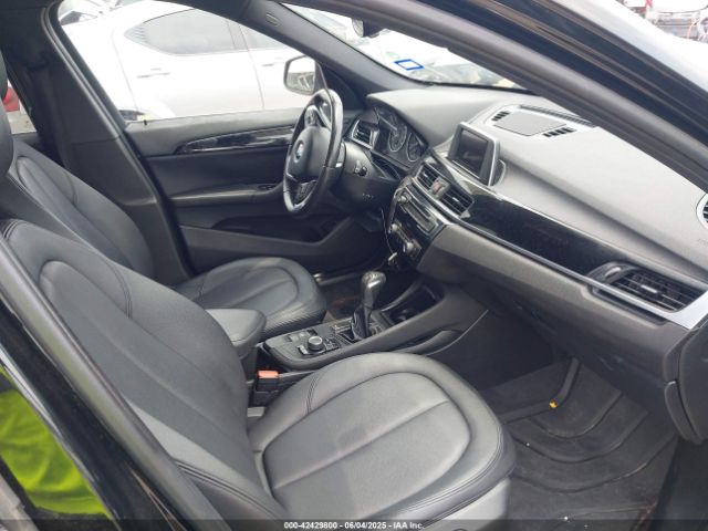 2017 BMW X1 WBXHT3Z34H4A53528 Photo 4