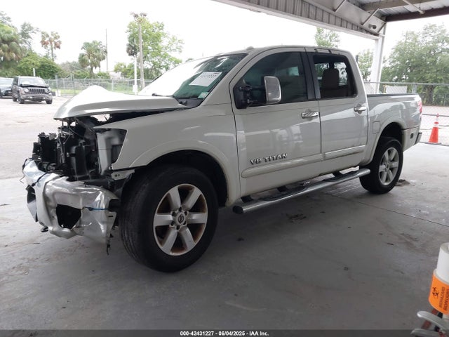 1N6BA0ED1FN502929 Nissan Titan Sl