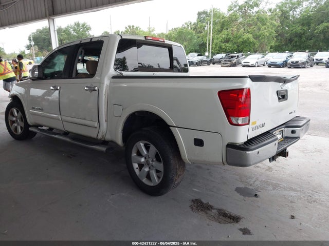 1N6BA0ED1FN502929 Nissan Titan Sl