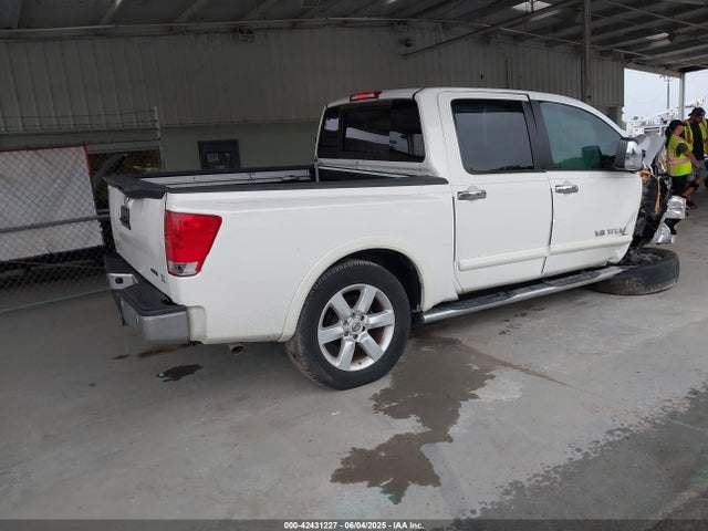1N6BA0ED1FN502929 Nissan Titan Sl
