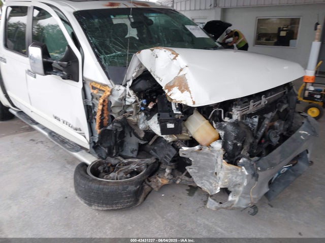 1N6BA0ED1FN502929 Nissan Titan Sl
