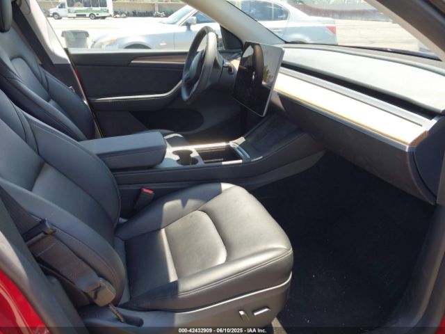 2023 TESLA MODEL Y 7SAYGDEF6PF884673 Photo 4