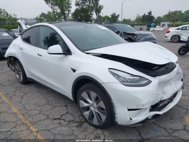 2023 TESLA MODEL Y 7SAYGDEE9PA038011