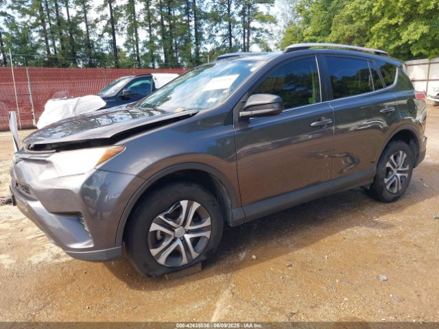 2016 TOYOTA RAV4 JTMZFREV6GJ091570 Photo 1