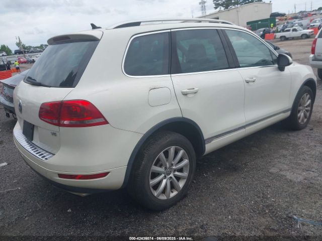 2011 VOLKSWAGEN TOUAREG WVGFF9BPXBD006399 Photo 3