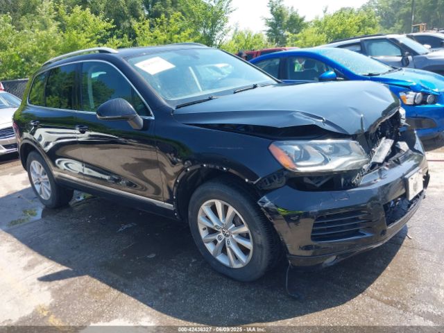 2014 VOLKSWAGEN TOUAREG WVGEF9BPXED012395