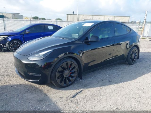 2022 TESLA MODEL Y 7SAYGDEF4NF515596 Photo 1