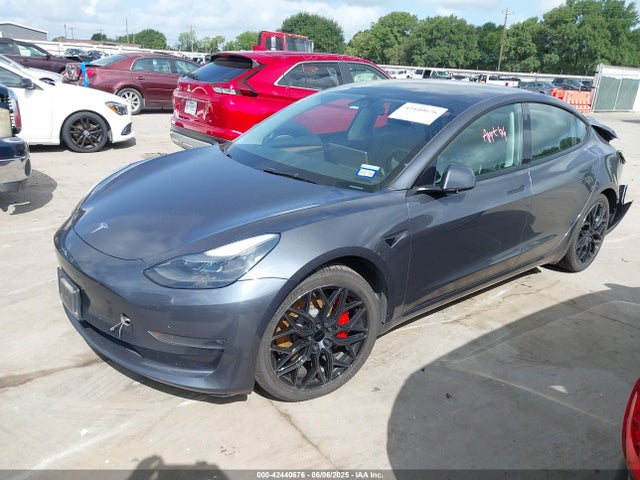 2023 TESLA MODEL 3 5YJ3E1EC9PF517784 Photo 1