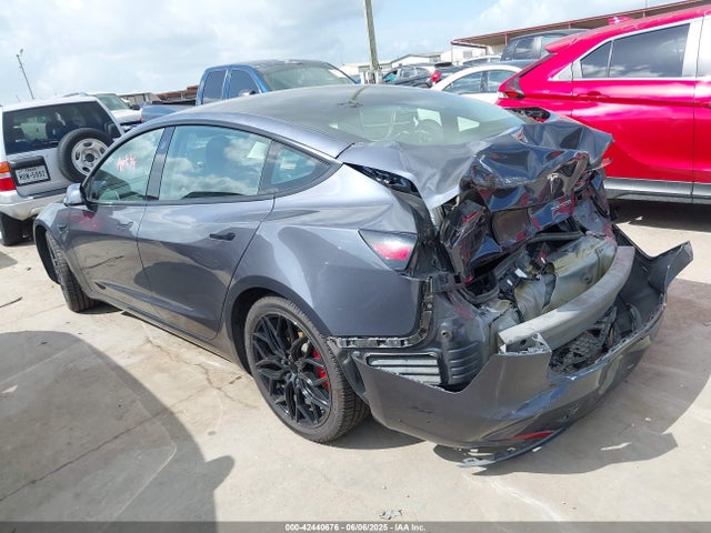 2023 TESLA MODEL 3 5YJ3E1EC9PF517784 Photo 2