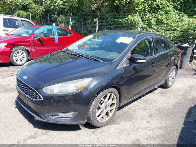 2015 FORD FOCUS 1FADP3F26FL283668 Photo 1