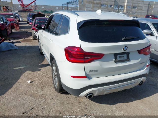 2019 BMW X3 5UXTR7C59KLF36855 Photo 2