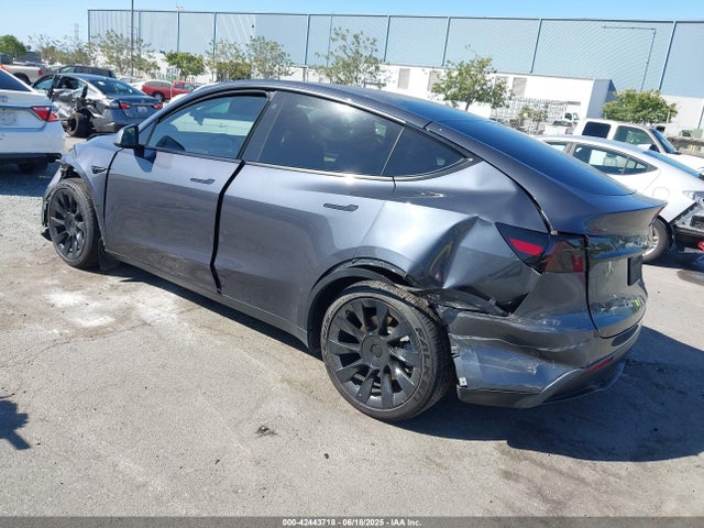 2023 TESLA MODEL Y 7SAYGDEE5PF588017 Photo 2