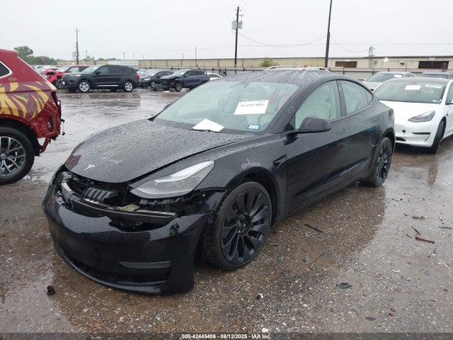 5YJ3E1EC9NF354857 Tesla 2022
