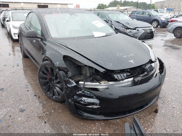 5YJ3E1EC9NF354857 Tesla 2022