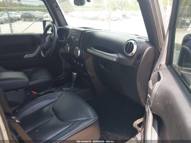 Auction sale of the 2015 Jeep Wrangler Unlimited Sahara, vin: 1C4BJWEG5FL712798, lot number: 42446416