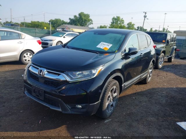 2018 HONDA CR-V 7FARW2H50JE100124 Photo 1