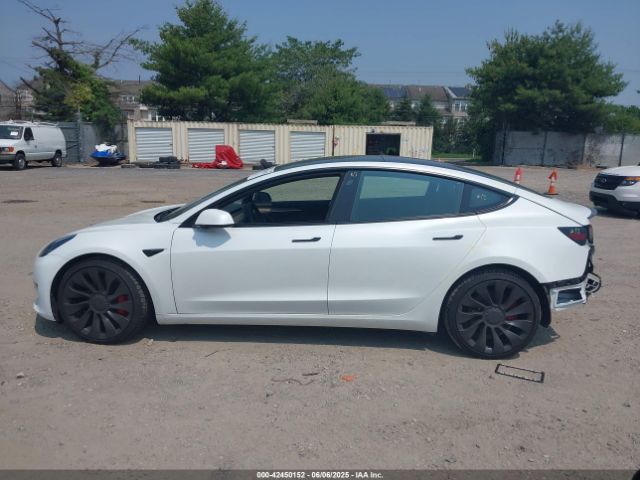 5YJ3E1ECXNF335833 Tesla 2022