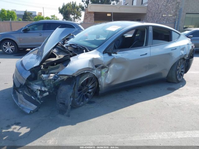 2024 TESLA MODEL Y 7SAYGDEF6RF121667 Photo 1
