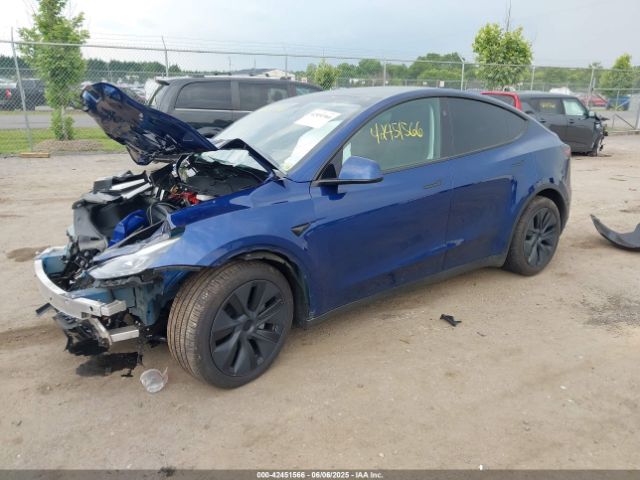 2024 TESLA MODEL Y 7SAYGDEE3RA324648 Photo 1
