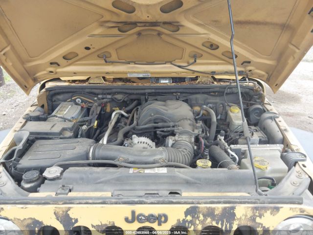 1C4BJWDG9EL100345 Jeep Wrangler Unlimited Sport
