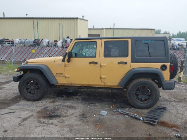 1C4BJWDG9EL100345 Jeep Wrangler Unlimited Sport