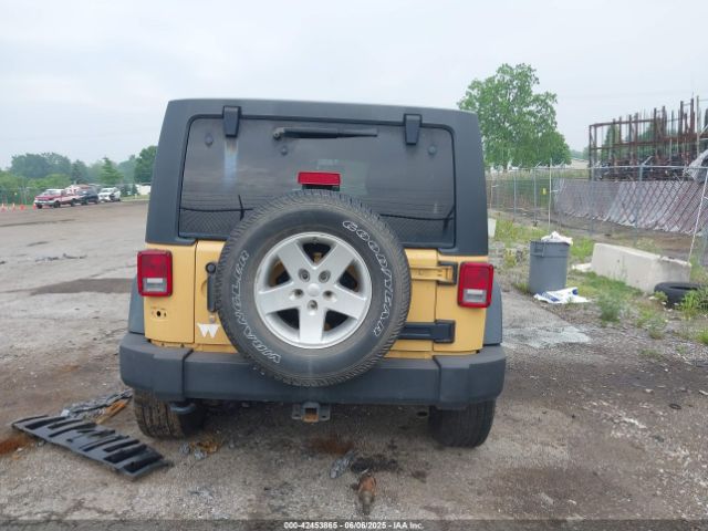 1C4BJWDG9EL100345 Jeep Wrangler Unlimited Sport