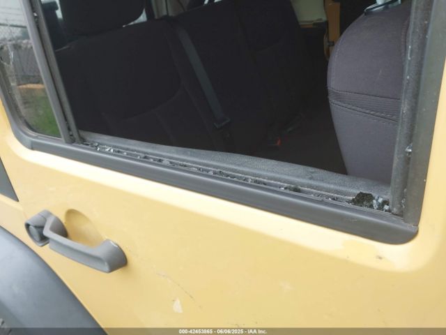 1C4BJWDG9EL100345 Jeep Wrangler Unlimited Sport