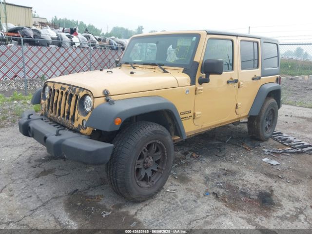 1C4BJWDG9EL100345 Jeep Wrangler Unlimited Sport