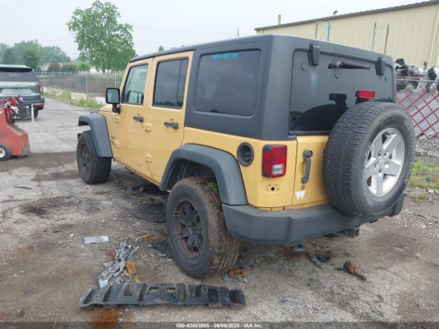 1C4BJWDG9EL100345 Jeep Wrangler Unlimited Sport