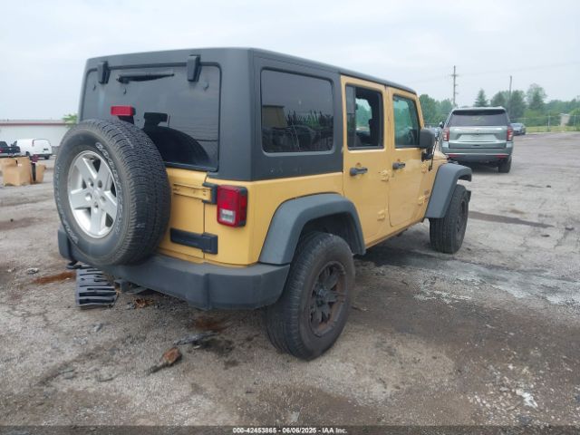 1C4BJWDG9EL100345 Jeep Wrangler Unlimited Sport