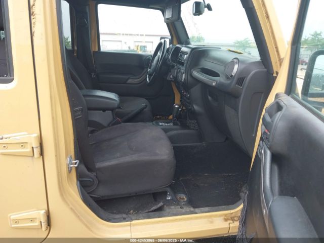 1C4BJWDG9EL100345 Jeep Wrangler Unlimited Sport