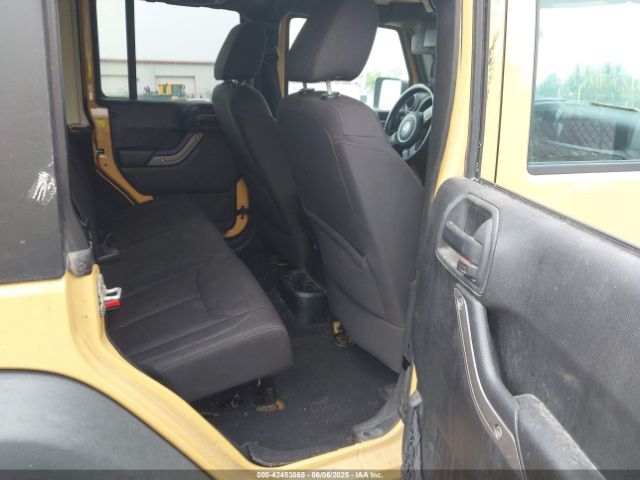 1C4BJWDG9EL100345 Jeep Wrangler Unlimited Sport