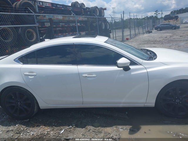 JM1GJ1W51G1477142 Mazda py