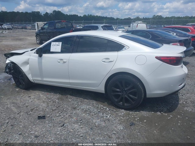 JM1GJ1W51G1477142 Mazda py